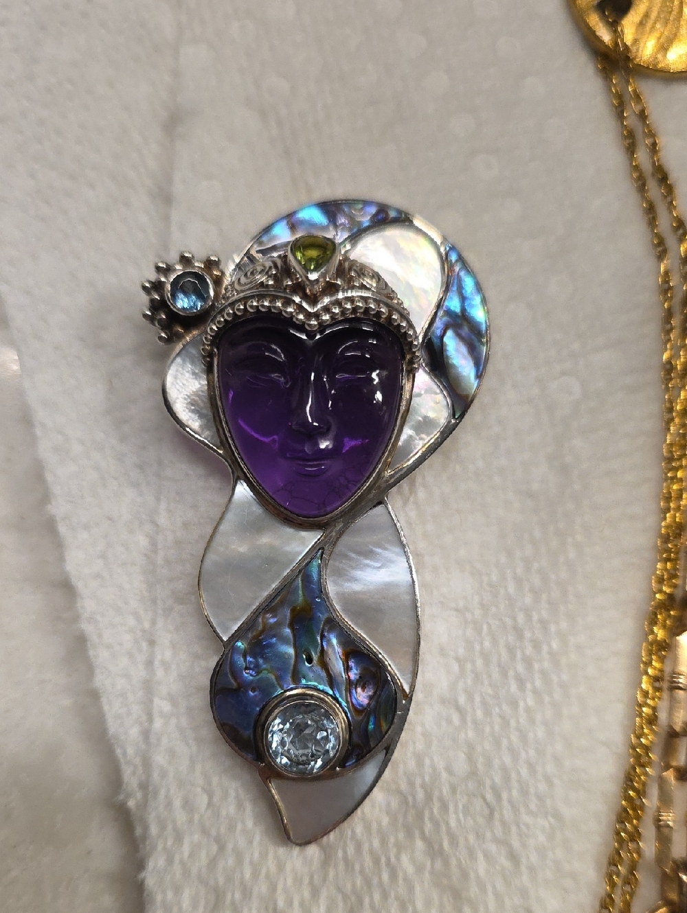 Sterling Silver Face Pendant with Purple Amethyst Accent